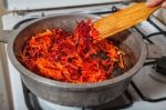 Frying In A Pan Carrots And Beets Stock Photo