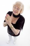 View Of Praying Old Woman Stock Photo