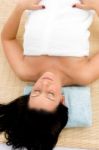 Top View Of Resting Female On An Isolated White Background Stock Photo