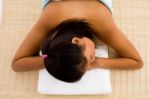 Resting Beautiful Adult Woman In Towel Stock Photo