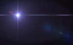 Abstract Lens Flare Light Over Black Background Horizontal Stock Photo