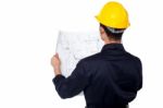 Civil Engineer Reviewing Blueprint Stock Photo