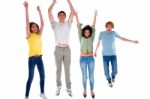 Group Of Teenagers Jumping Stock Photo