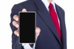 Smartphone On Businessman Hand Stock Photo