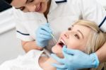 Pretty Woman Under Dental Treatment Stock Photo