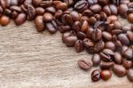 Coffee Beans On The Wooden Floor Stock Photo