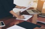 Woman Standing And Writing Document Hand Close Up At Desk Stock Photo