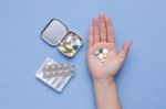 Pills And Medicine Capsule In Hand Stock Photo