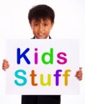 Small Boy Showing Kids Stuff Board Stock Photo