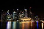 The Singapore Skyline At Night Stock Photo