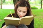 Young Woman Writing Stock Photo