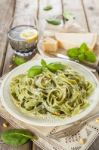 Homemade Spinach Pasta With Pesto And Parmesan Cheese Stock Photo