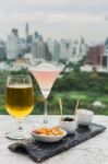 Glass Of Beer And Cocktail With Snack Stock Photo