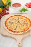 Italian Original Thin Crust Pizza Stock Photo