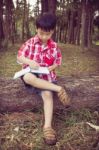 Full Body. Asian Boy Writing On Notebook. Education Concept. Vin Stock Photo