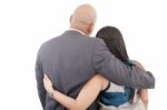 Back View Of Couple Hug And Look Into A Distance. Formal Guy And Stock Photo