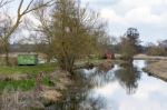 Wooden Buildings Near Papercourt Lock On The River Wey Navigatio Stock Photo