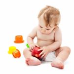 Cute Infant Boy With Apple Stock Photo