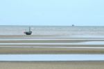 Fisherman Boat On Sand Beach Stock Photo