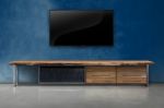 Led Tv On Concrete Wall With Wooden Furniture In Living Room Stock Photo