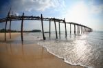 Old Wooden Bridge And Beach Stock Photo