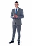 Businessman steepling Stock Photo