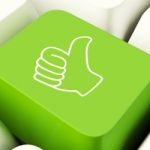 Thumbs Up Computer Key Stock Photo