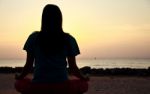 Women Practices Yoga Stock Photo