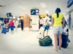 Blurred Crowd Of Tourist In The Airport Stock Photo