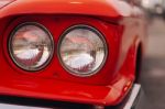 Close-up Of The Front Of The Red Vintage Car Stock Photo