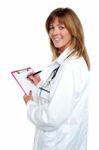 Beautiful Smiling Physician Writing Prescription Stock Photo