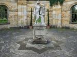 Old Statue Of A Young Man And Eagle In The Garden At Hever Castl Stock Photo