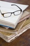 Glasses On Old Books Stock Photo