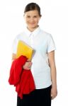 Portrait Of Happy School Girl, Posing Stock Photo