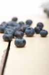 Fresh Blueberry On White Wood Table Stock Photo