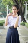 Portrait Of Thai High School Student Uniform Teen Beautiful Girl Happy And Relax, Stock Photo