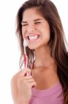 Young Women Closing Her Eyes Brushing Her Teeth Stock Photo