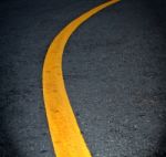 Yellow Lines On Asphalt Stock Photo