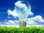 Light Bulb With Blue Sky Stock Photo