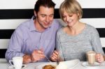 Beautiful Couple Having Morning Meal Together Stock Photo