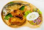 Fried Mackerel Fish Adn Fried Chicken On Wooden Dish Stock Photo