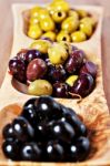 Variety Of Green, Black And Mixed Marinated Olives Stock Photo