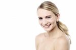 Smiling Woman With Bare Shoulders Stock Photo