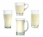 Glass Of Milk Isolated On The White Background Stock Photo