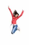 Jumping Youngster With Headphone Stock Photo