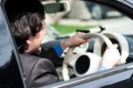 Businessman Driving His Luxury Dream Car Stock Photo