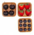 Fresh Summer Fruits, Cherry, Strawberry, And Blueberry In Wooden Stock Photo