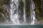 Waterfall At Milford Sound Stock Photo