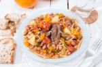 Brown Beans With Meat And Carrot Stock Photo