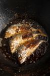 Fish Frying In Hot Oil Stock Photo